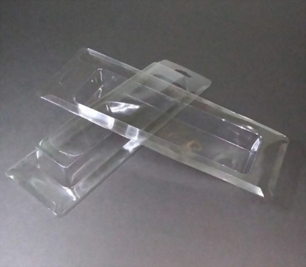 Thermoformed plastic flanged hood/blister for industrial use