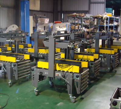Top and Bottom Side Driven Carton Sealer
