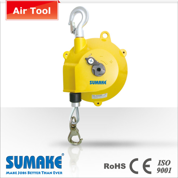 Air tool spring driven retractable spring balancer