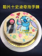相片+史迪奇抱手機