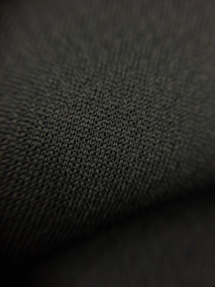 poly/spandex double knit of moss with wicking chemical Sports fabric