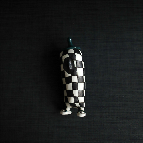Black and white checkered condom man