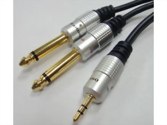 3.5mm Stereo Plug - 2x6.3mm Mono Plugs. D=4+4mm