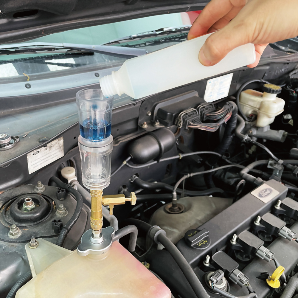 Checks for combustion leaks caused by bad head gaskets