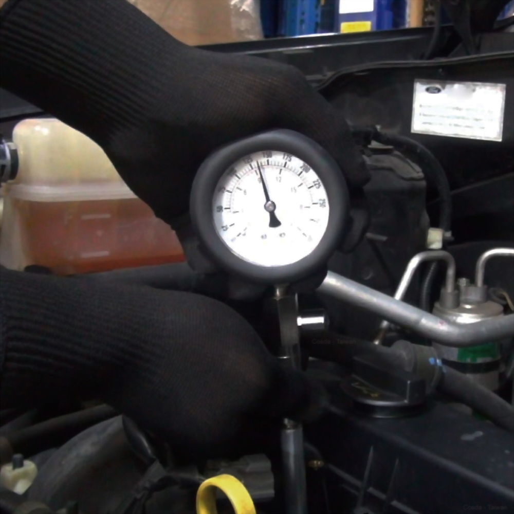 Hand press the gauge to test compression