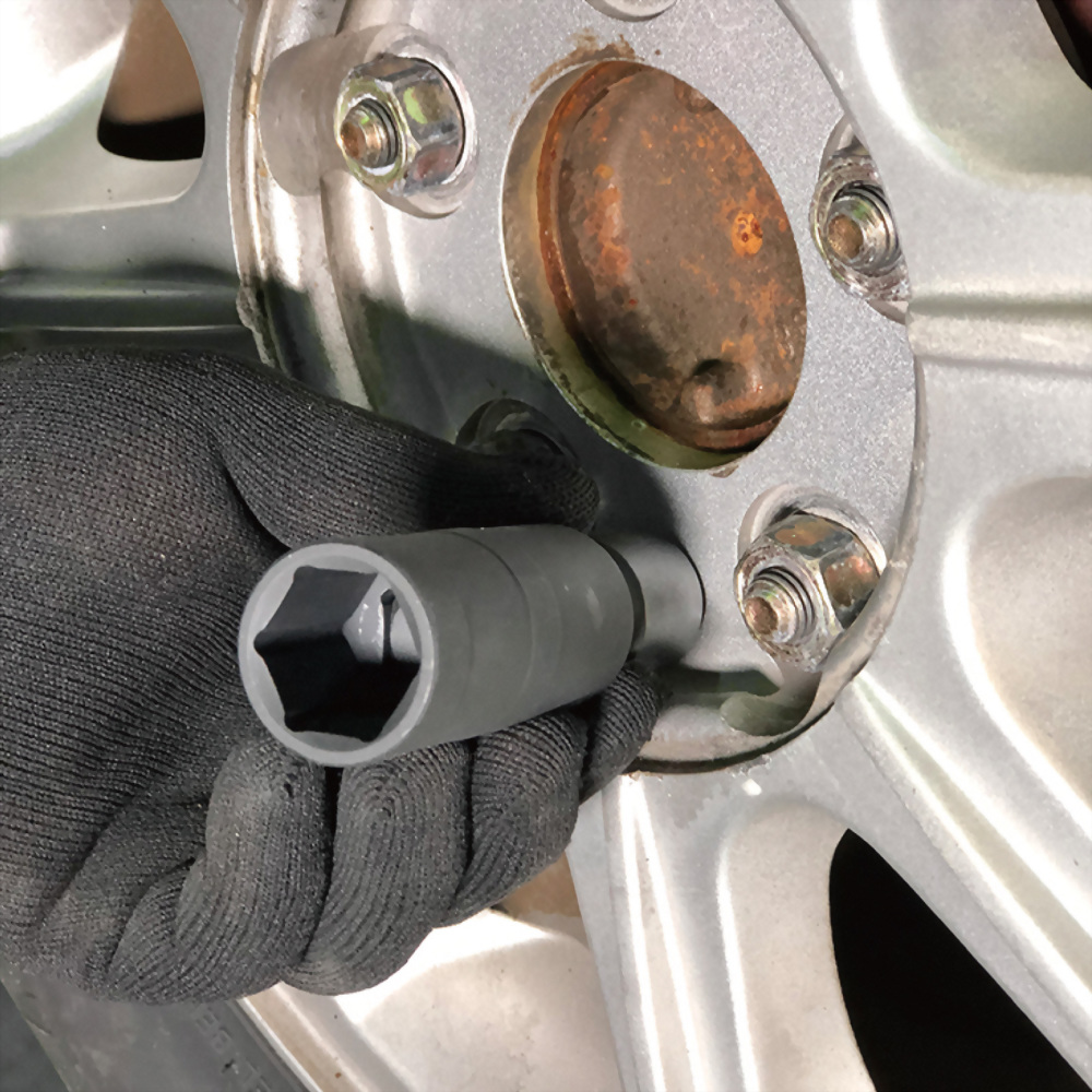 automotive repair tool for wheel change